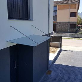 Deco-Vidre vivienda con toldo de cristal